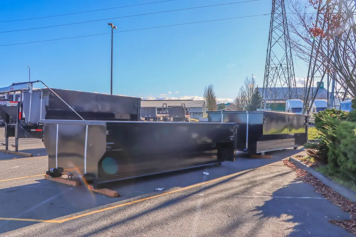 Roll-off dumpster ready for waste disposal at job site for Roofing Dumpster Rental in Forrest City